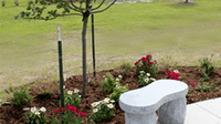 Urn placement for a garden burial at Reflection Pointe