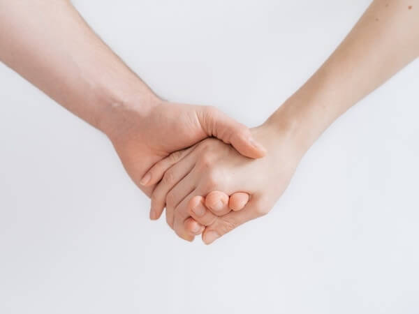 Friend consoling a grieving loved one